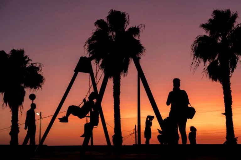 Activities - silhouette of people on swing during sunset