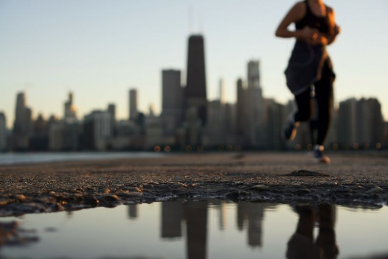 Activities - woman running near body of water