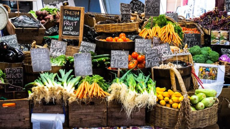 Farmers Market - yellow banana fruit on brown wooden crate