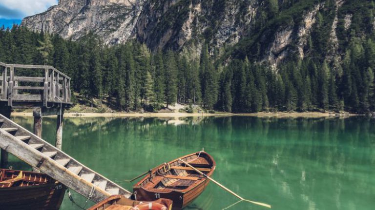 Outdoor - brown canoe docking on gray wooden staircaes